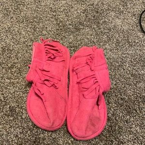 Little girls pink slip on moccasins